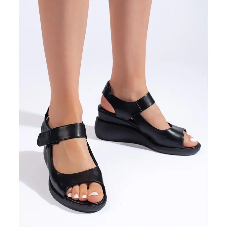 Comfortable black wedge sandals by Sergio Leone